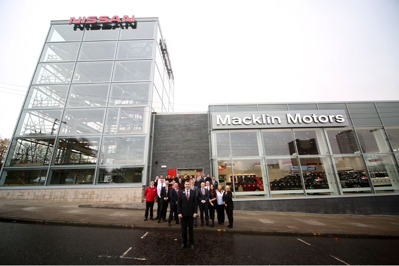 Staff outside Macklin Motors Nissan Glasgow