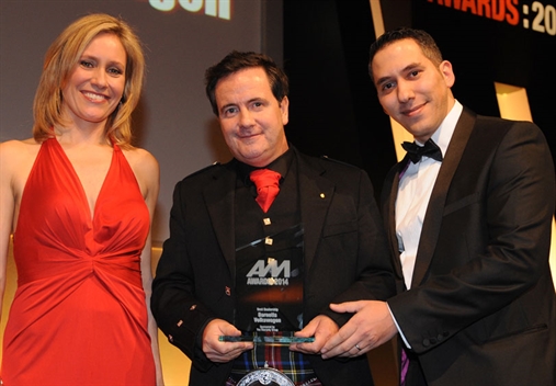 Barnetts MD James Brown, centre, with Sophie Raworth  and The Warranty Group’s Serkan Obuz